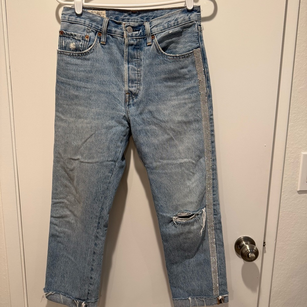 Levi’s Light Wash Distressed Boyfriend Jeans with Side Rhinestone Trim